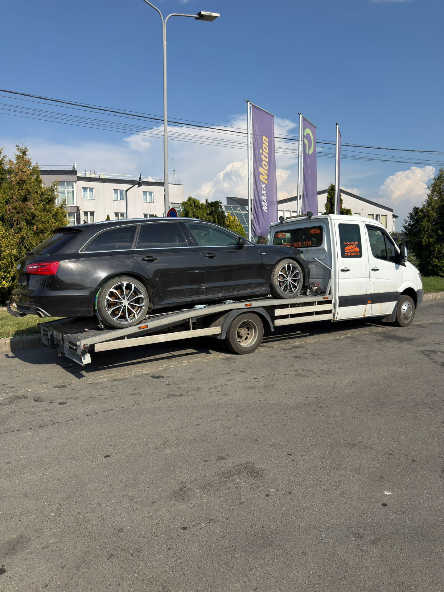 Tractare Audi A6 break pe platformă în Cluj-Napoca