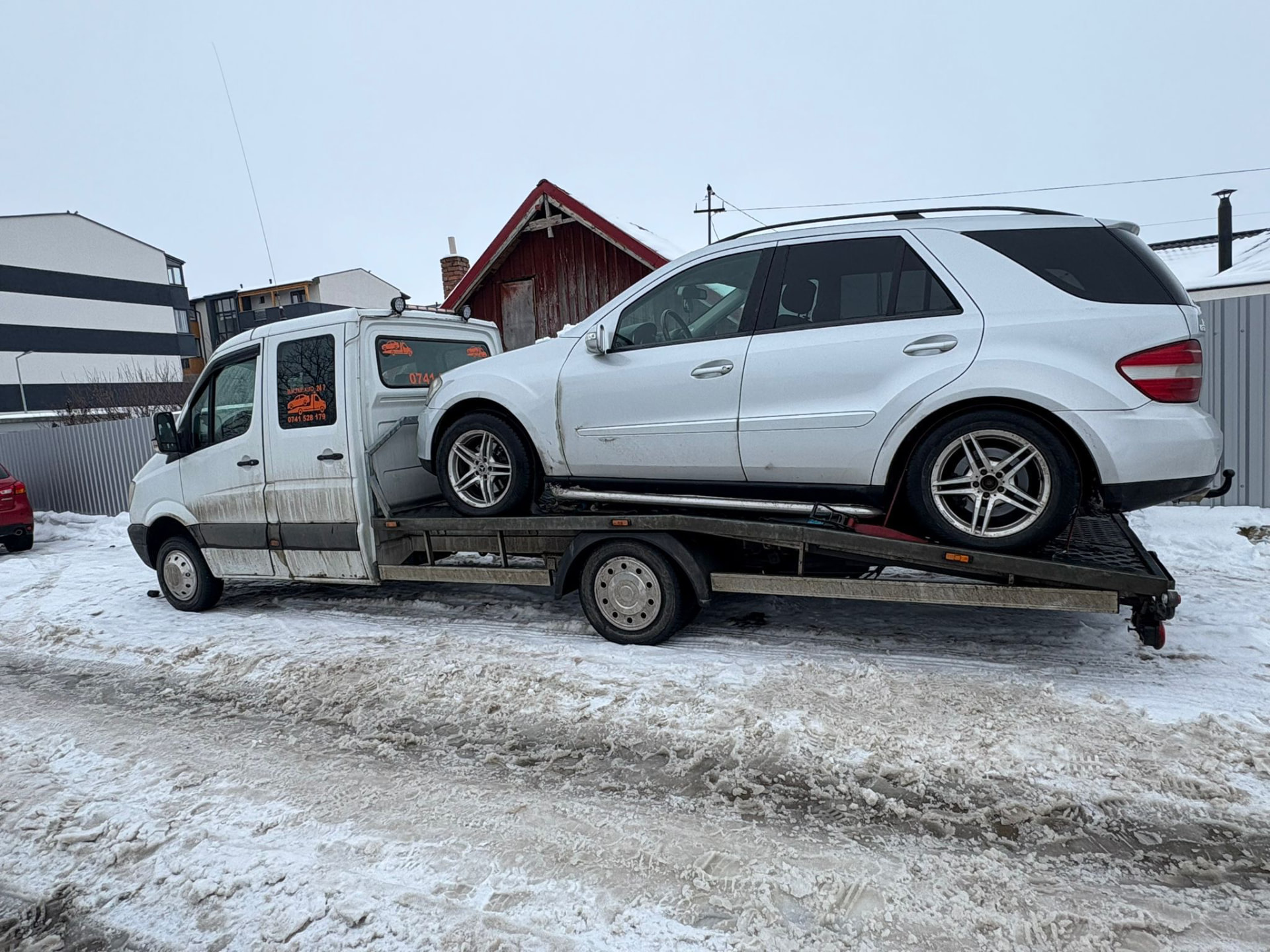 Tractare SUV Mercedes ML iarna, pe zăpadă, în Cluj